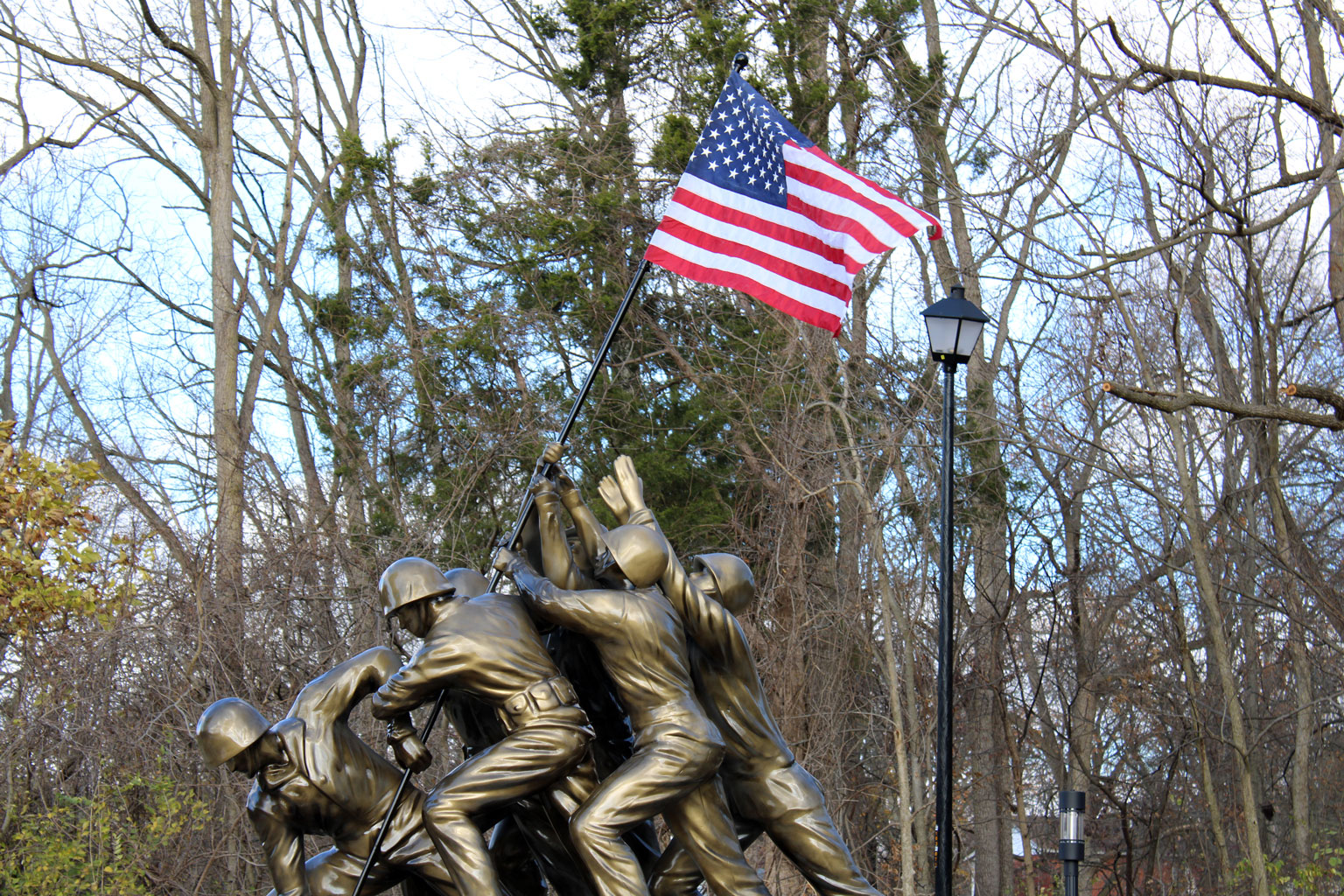 An American flag flies atop the National Iwo Jima Memorial at Huntington's Memorial Park.